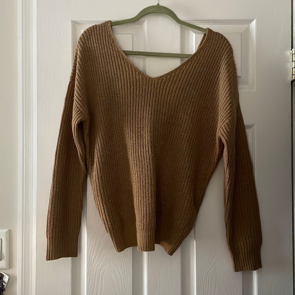 Size medium. Chestnut sweater twist back